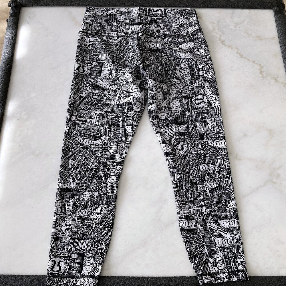 Like new! Lululemon Wunder Train High-Rise Tight 25" black & white leggings